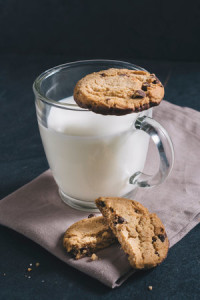 Chip chocolate cookies and glass of milk